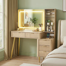 Wooden vanity table with LED mirror, storage drawers, makeup, jewelry, and charging phone