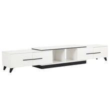 Modern white TV stand with black accents and storage drawers