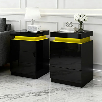 Modern black nightstands with yellow LED lights in a stylish living room setting