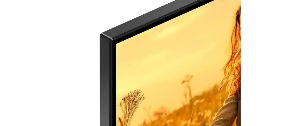 Close-up of slim black TV bezel displaying a vivid outdoor scene, bargain electronics at Stacks Warehouse AU