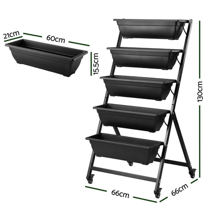 Black 5 tier vertical garden bed replacing a cluster of separate pots