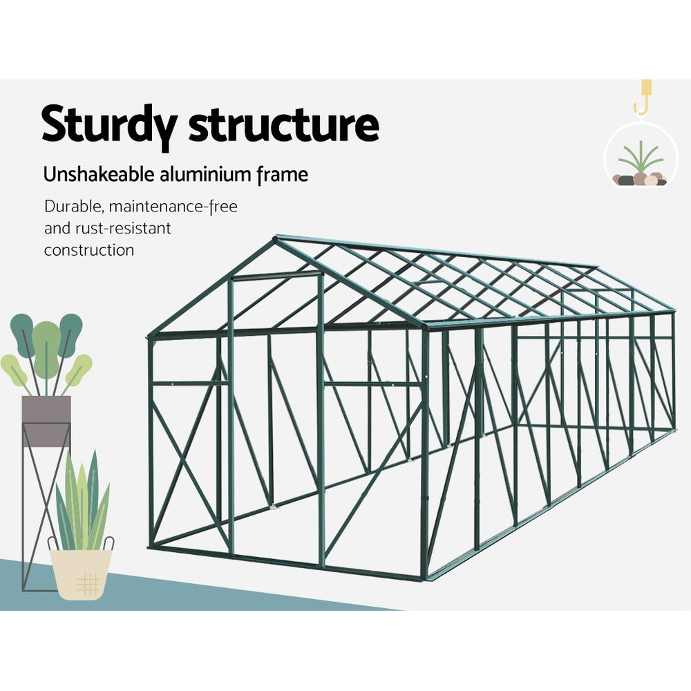 Green Fingers greenhouse gutter system directing rainwater away