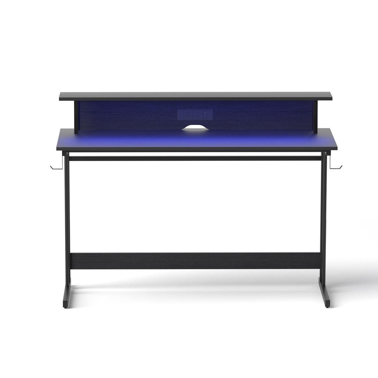 Modern black desk with blue LED backlight and built-in power outlets for home office setup