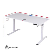 White height-adjustable standing desk, 140x70cm, 65kg max load, ideal for home office or workspace