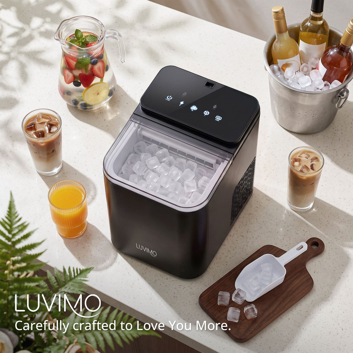 Luvimo 15kg ice maker supplied with an ice scoop, black countertop machine