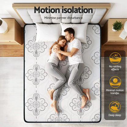 Couple sleeping on patterned queen mattress with motion isolation, ideal for Stacks Warehouse shoppers.