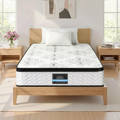 Giselle Bedding mattress on modern wooden bed frame in bright bedroom, Stacks Warehouse AU