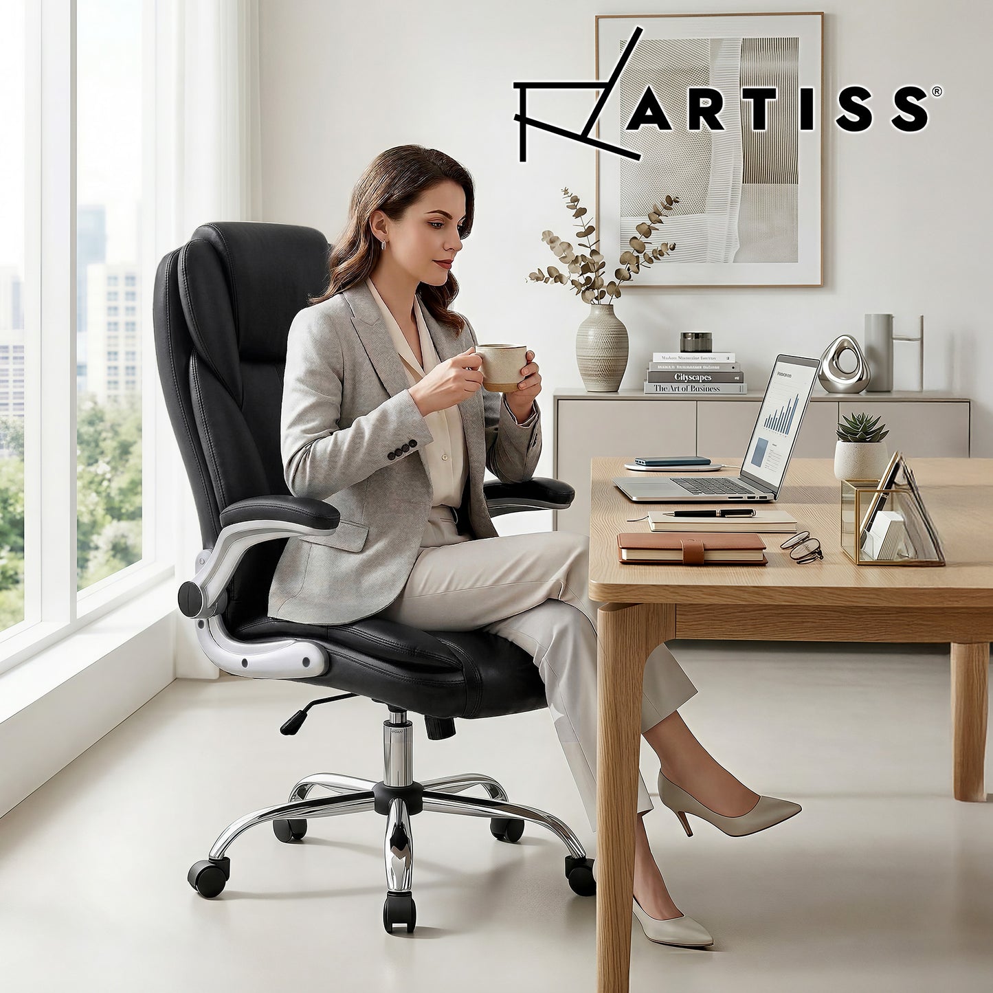 Black leather office chair with chrome base, ergonomic design, adjustable armrests, ideal for home or corporate workspace