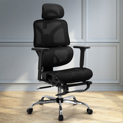 Black ergonomic mesh office chair with headrest, adjustable arms, and chrome base on wood floor