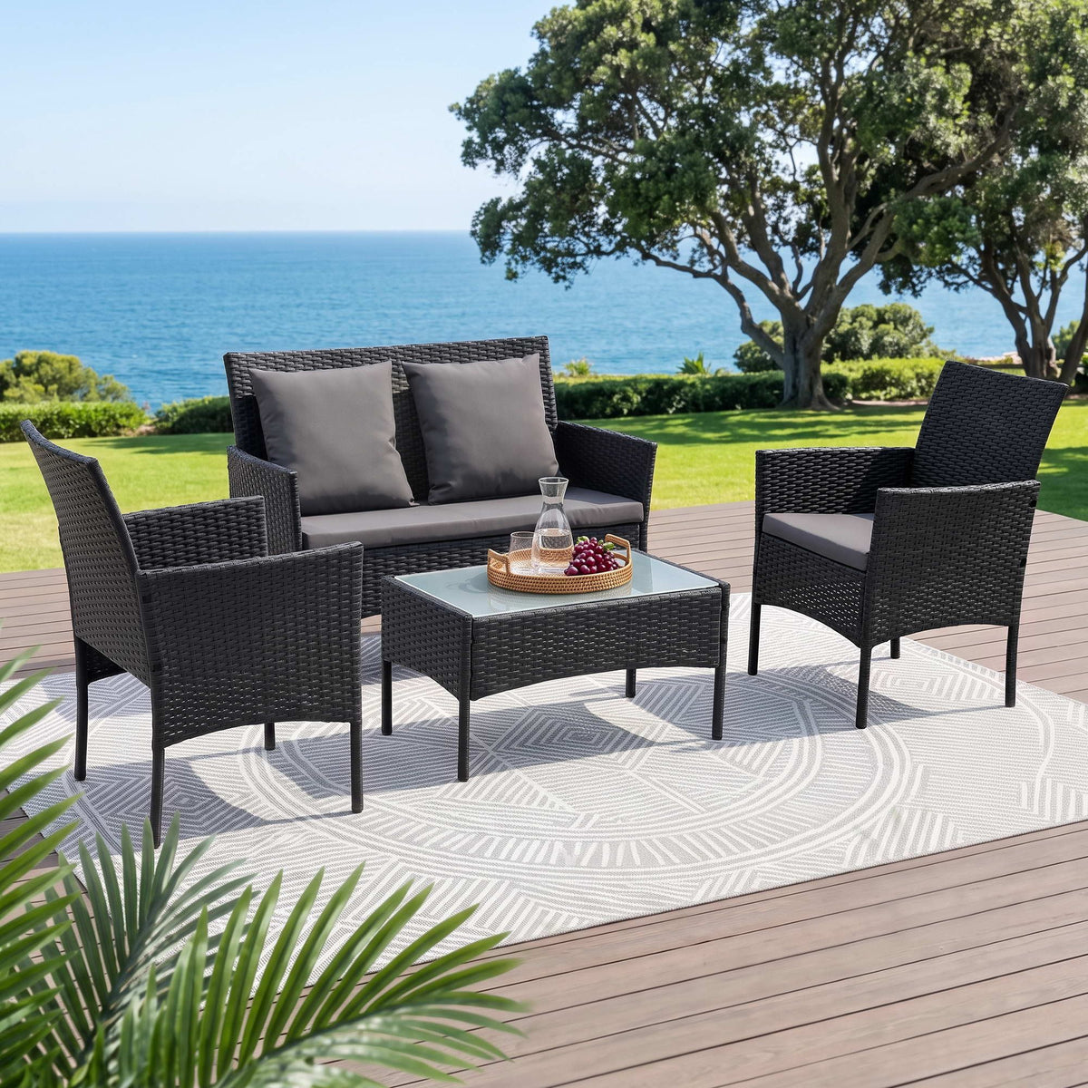 Gardeon 4 piece outdoor sofa set in black rattan with grey cushions