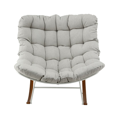 Gray tufted armchair with wooden legs, modern cozy seating for living room