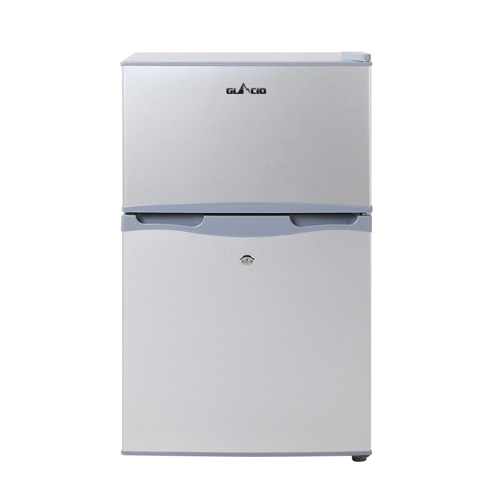 Compact silver Glacio mini fridge with top freezer, ideal for small spaces and budget shopping