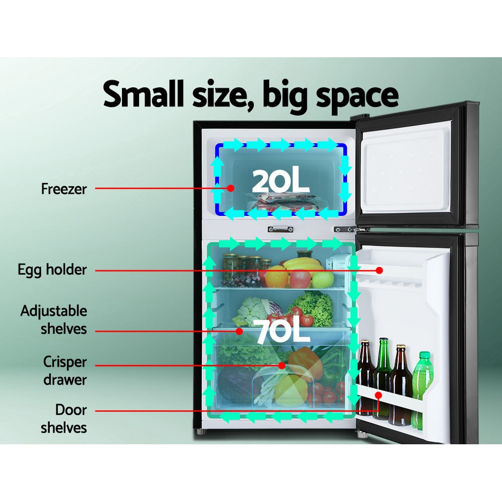 Compact 20L freezer and 70L fridge with adjustable shelves, crisper drawer, and door storage for efficient organization
