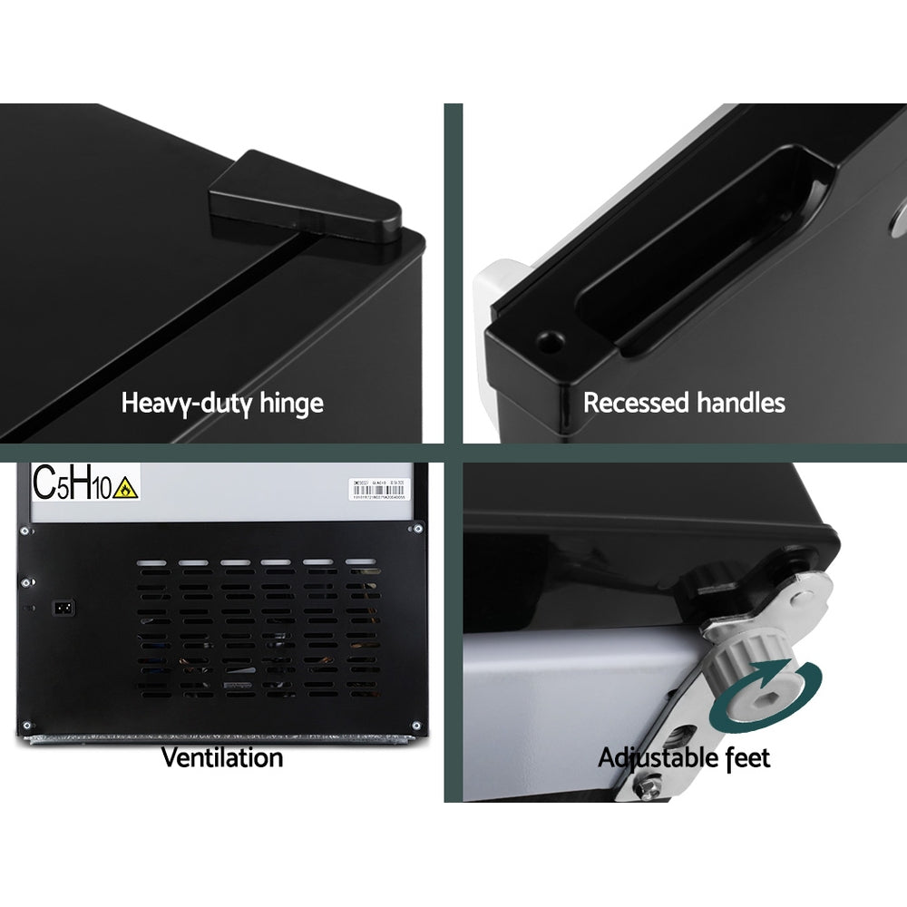 Black mini fridge with heavy-duty hinge, recessed handles, ventilation, and adjustable feet for stability.