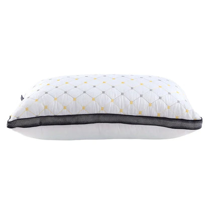 White decorative pillow with quilted diamond pattern and black mesh trim on white background