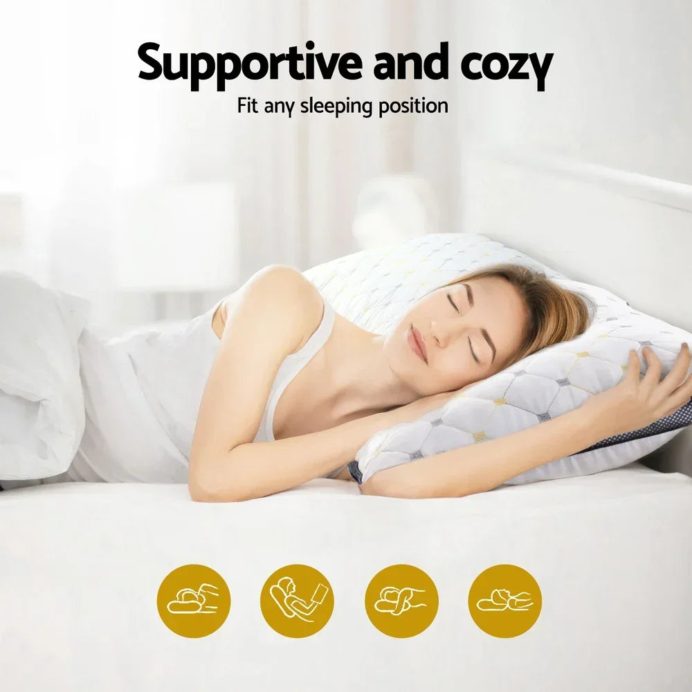 Woman sleeping comfortably on a supportive, cozy pillow with geometric pattern in a bright bedroom