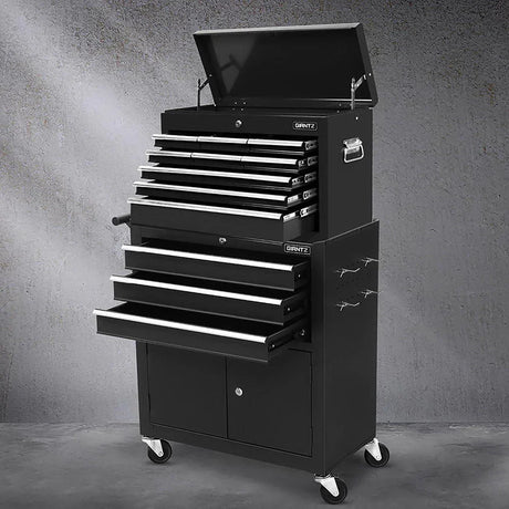 Black metal Gianz multi-drawer rolling tool chest with handles and open top lid on a gray concrete floor