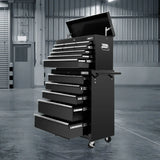 Black tool chest with multiple drawers in a warehouse setting