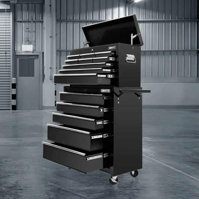 Black tool chest with multiple drawers in a warehouse setting