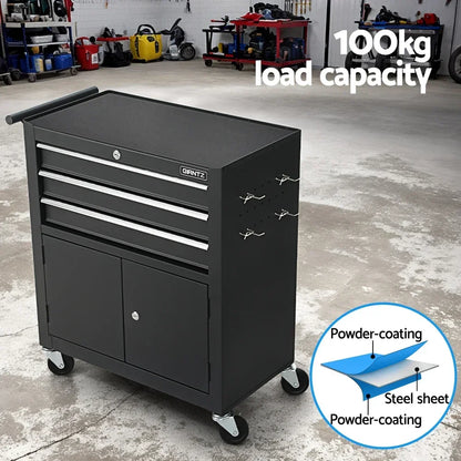 Black GIANTZ metal tool cabinet with drawers, wheels, hooks, in a workshop setting