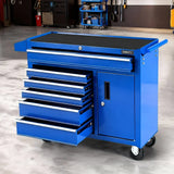 Blue mobile tool chest with multiple open drawers and sturdy wheels in a workshop setting