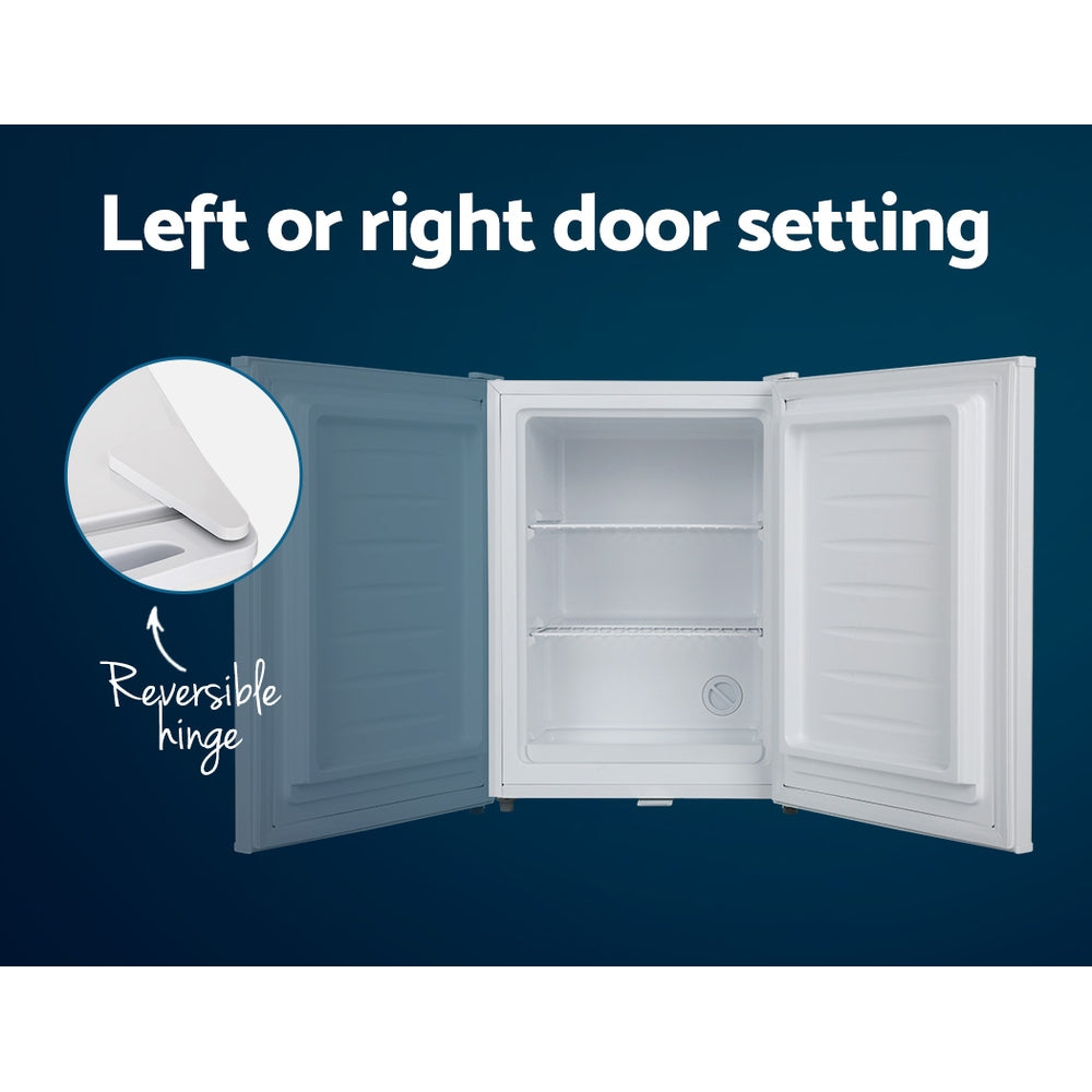 White mini fridge with reversible door hinge, left or right opening, empty interior shelves
