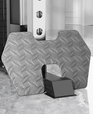 Diamond plate footplate attachment for gym machine on glossy floor