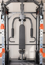 Home gym multi-station weight machine with black padded bench and metal frame