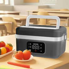 Electric lunch box with digital display on desk, fresh fruit nearby, classroom setting, Flea Market AU.