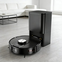 Black robot vacuum cleaner with docking station on modern living room floor