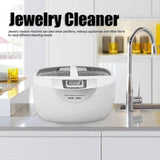 Digital ultrasonic jewelry cleaner machine for rings, watches, and makeup tools on kitchen counter