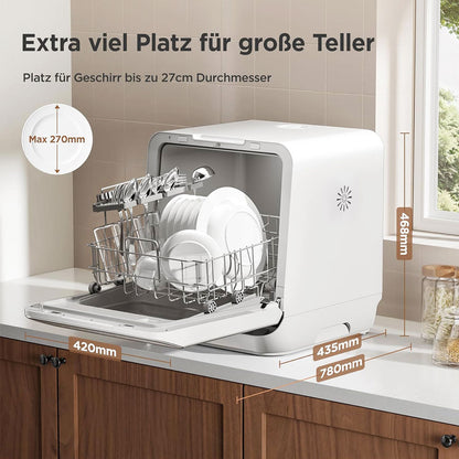 Compact white countertop dishwasher with spacious interior for plates up to 27cm, ideal for small kitchens.