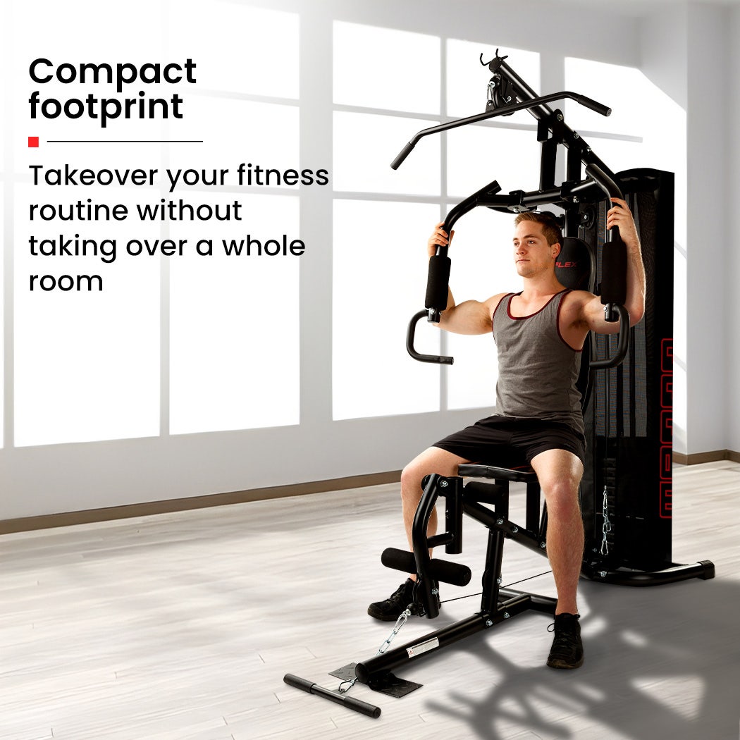 Man using compact home gym machine for strength training in bright room