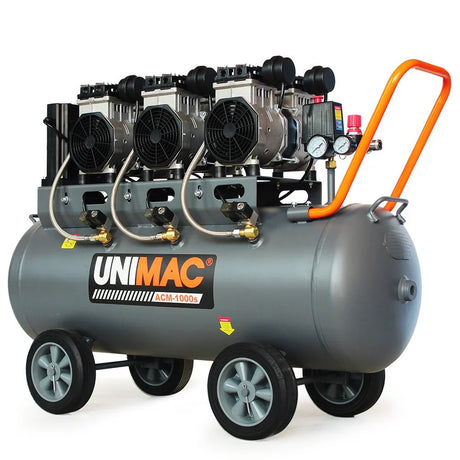 Large portable air compressor with wheels, triple motors, and pressure gauges