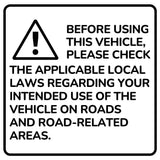 Vehicle safety warning sign advising users to check local road laws before use.