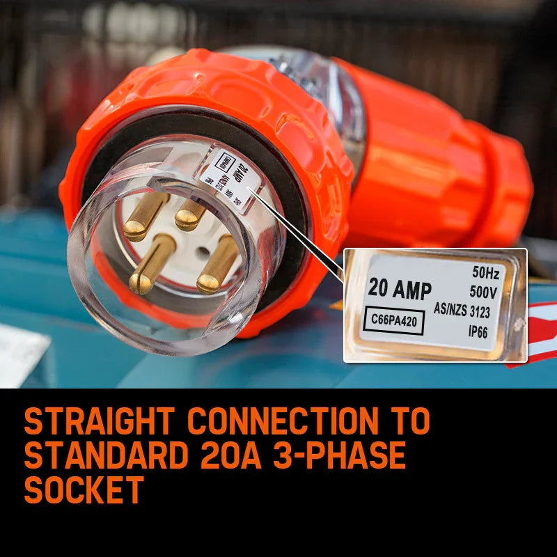 Industrial orange 20A 3-phase electrical plug, close-up, with 500V IP66 rating label