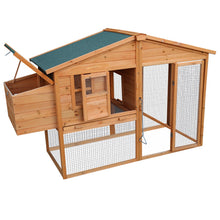 Wooden rabbit hutch with green roof and wire mesh enclosure for small pets