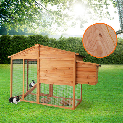 Wooden rabbit hutch with wire mesh, ramp, and nesting box for outdoor use in garden
