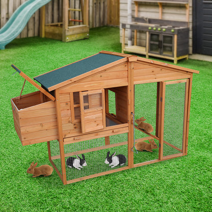 Wooden rabbit hutch with wire mesh enclosure, ideal for outdoor pet housing on artificial grass