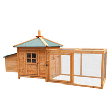 Wooden rabbit hutch with green roof and wire run, ideal for outdoor pet housing