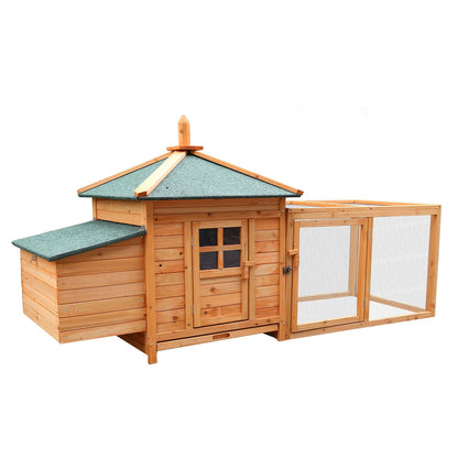 Wooden rabbit hutch with green roof and attached wire run, ideal for small pets