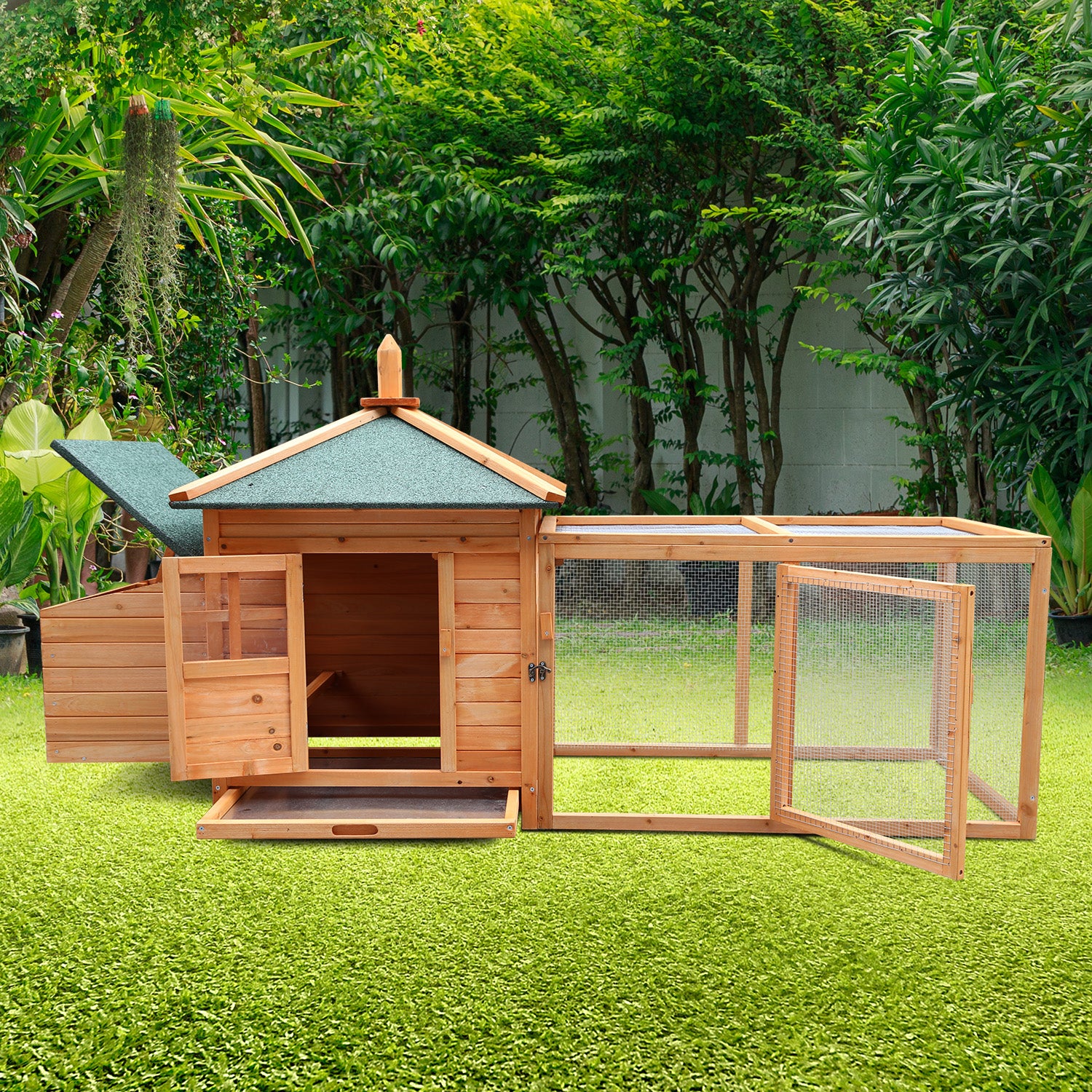 Wooden rabbit hutch with green roof and wire run, set on grass in garden