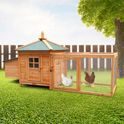 Wooden chicken coop with run, housing hens and chicks in backyard setting