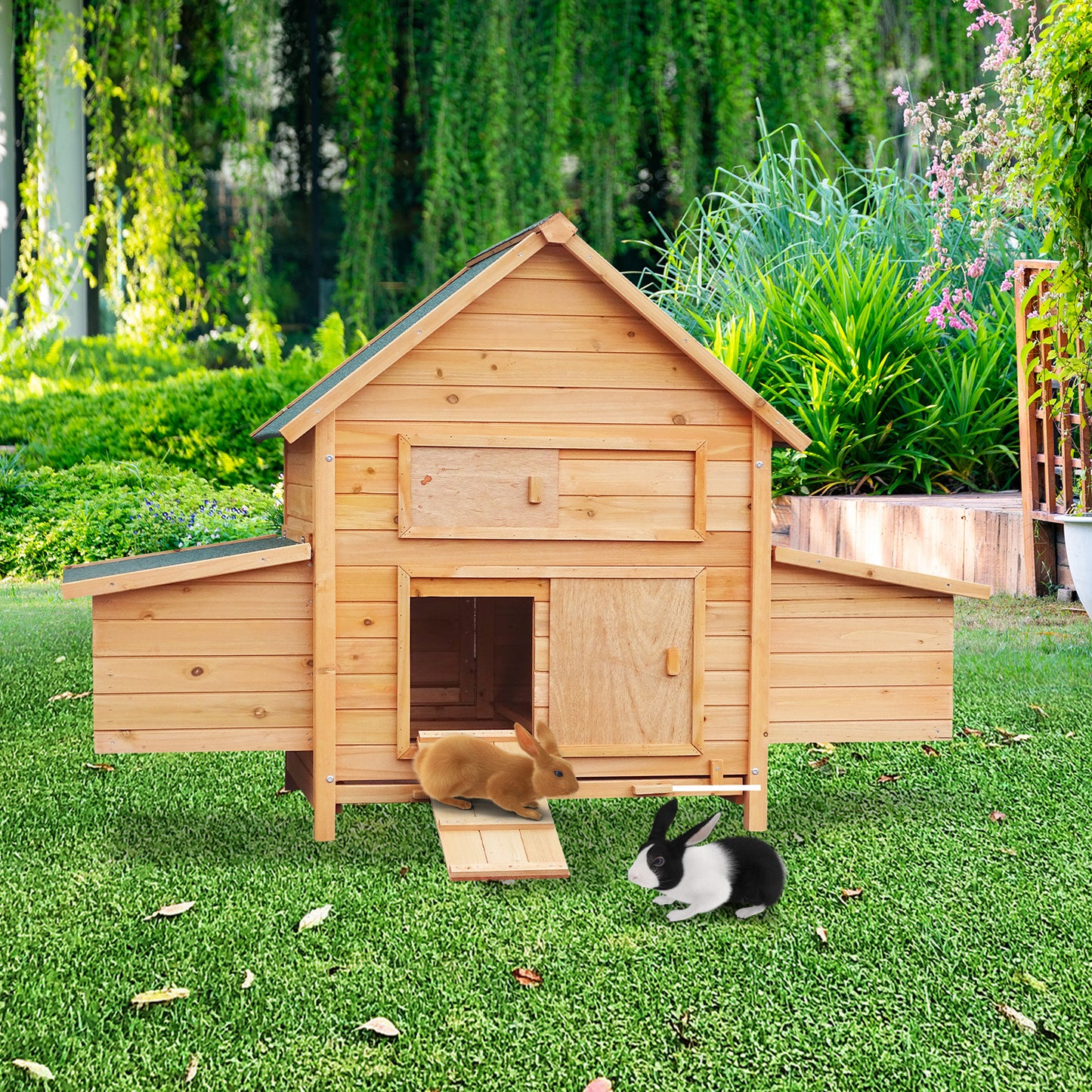 Wooden rabbit hutch with ramp and run, ideal for outdoor bunny housing in garden settings