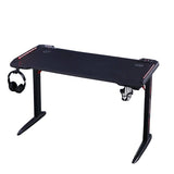 Black gaming desk with RGB lights, headphone hook, and cup holder for PC setup