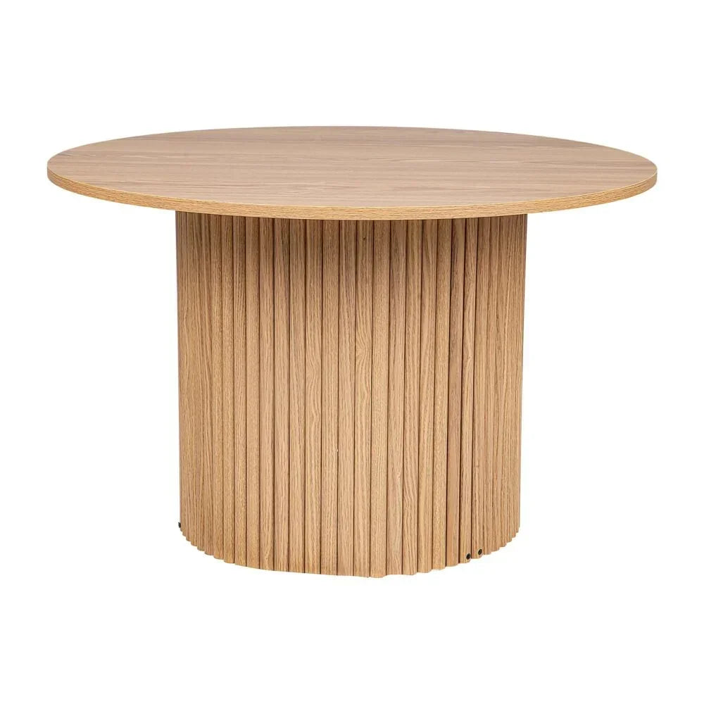 Round natural wood dining table with fluted cylindrical base and smooth top