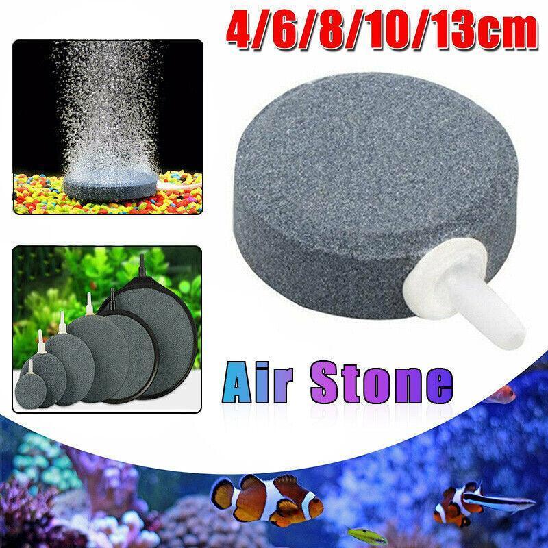 Round aquarium air stone disk with tube connector, suitable for fish tank aeration.