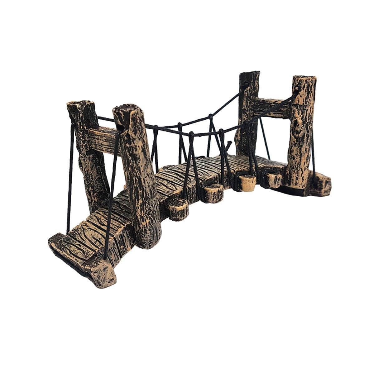 Miniature rustic wooden suspension bridge ornament with ropes, isolated on white background