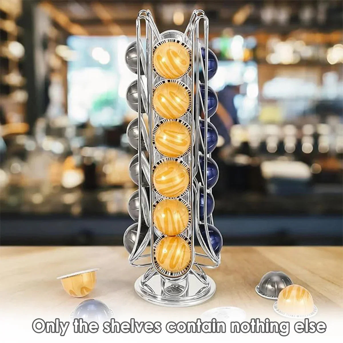 Rotating metal coffee pod holder with colorful pods on wooden countertop in kitchen