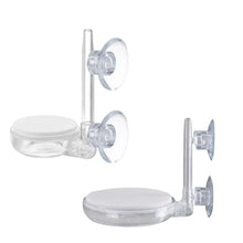 Clear plastic aquarium filter holder with suction cups, wall-mounted design